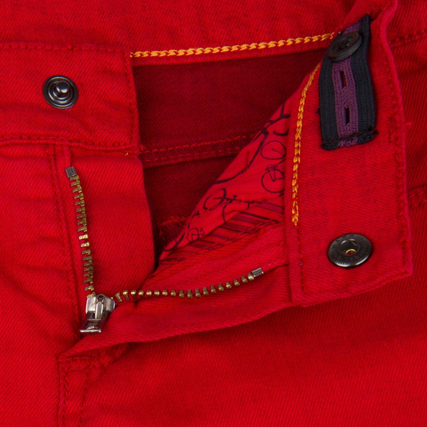 Girls Red Trousers With A Leather Logo Patc
