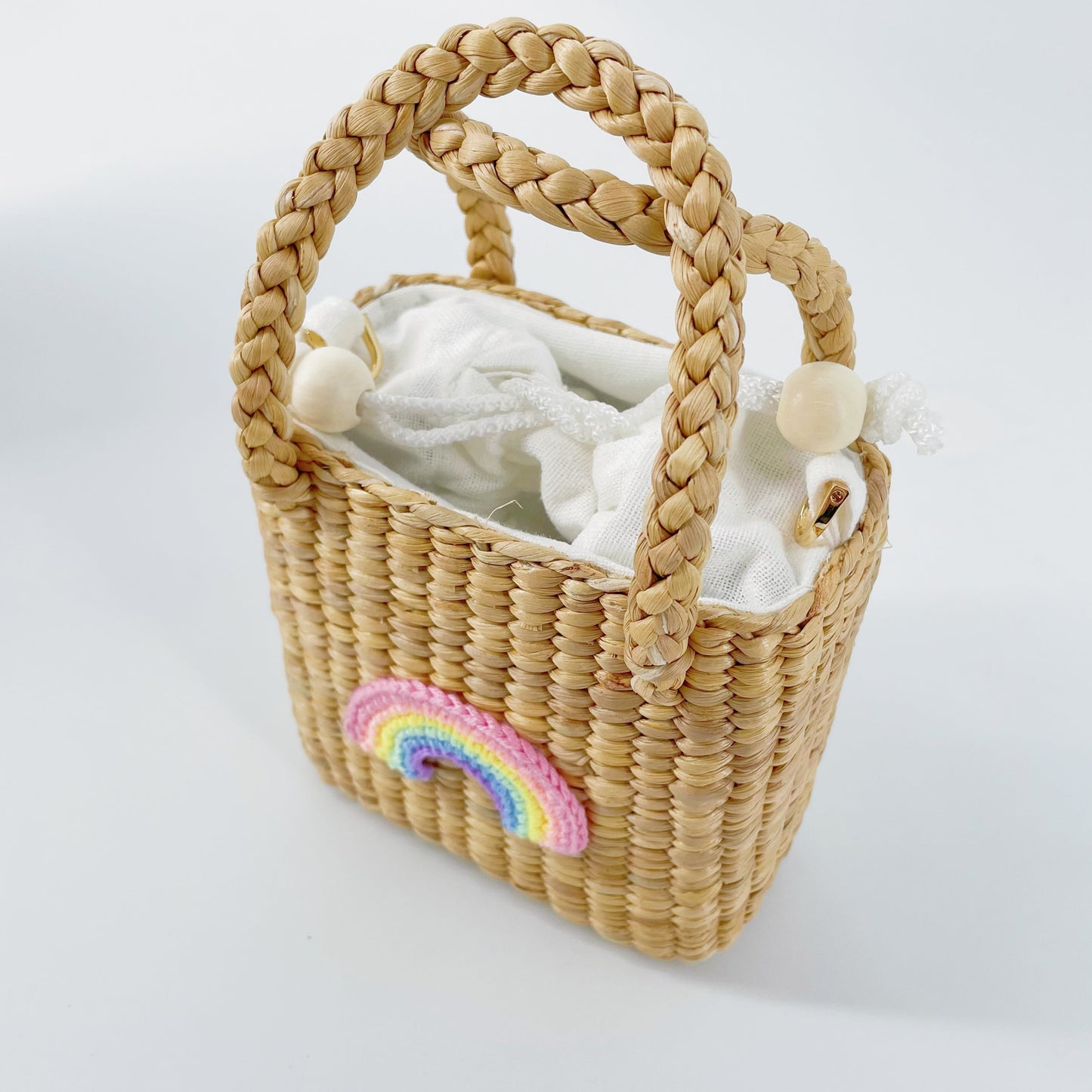 儿童彩虹手提复古草编包