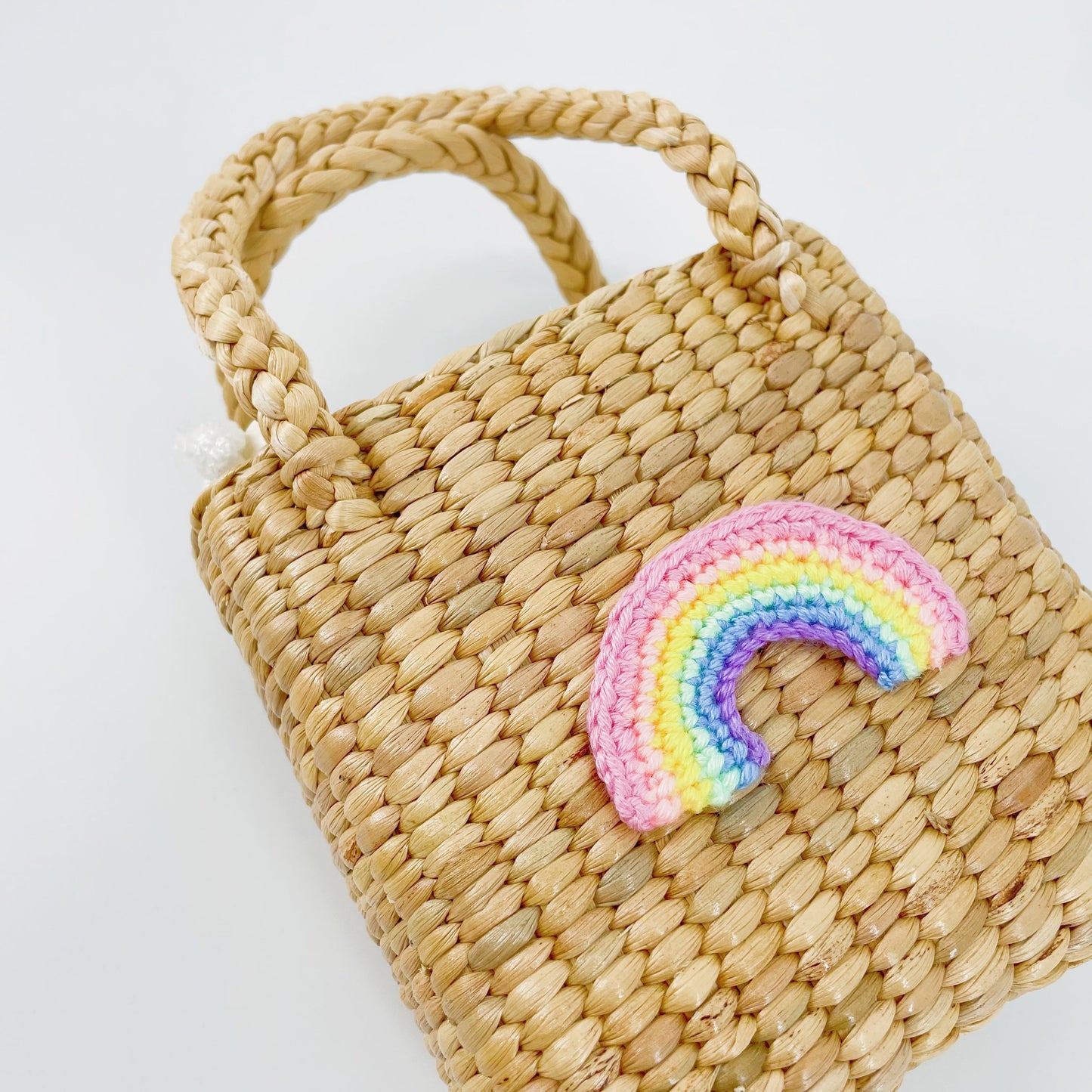 儿童彩虹手提复古草编包