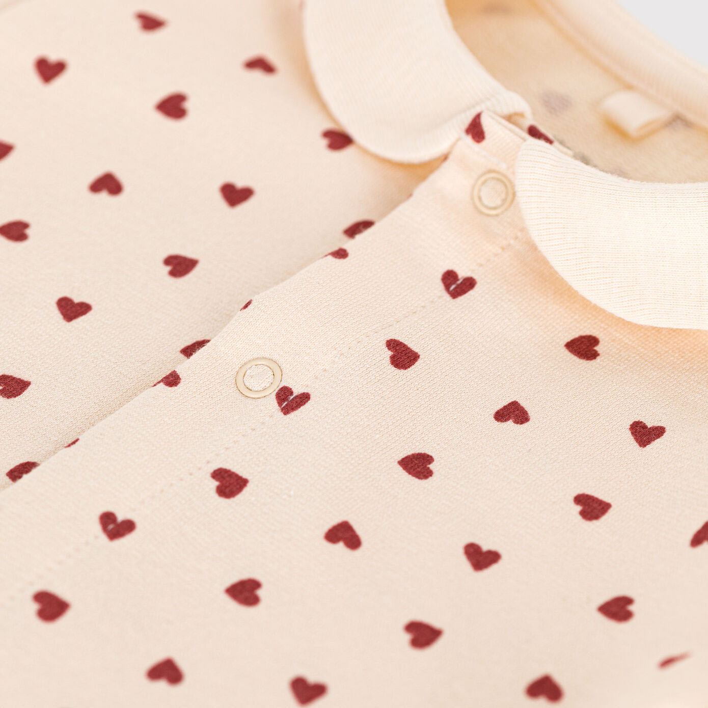 女婴象牙白爱心棉连体衣