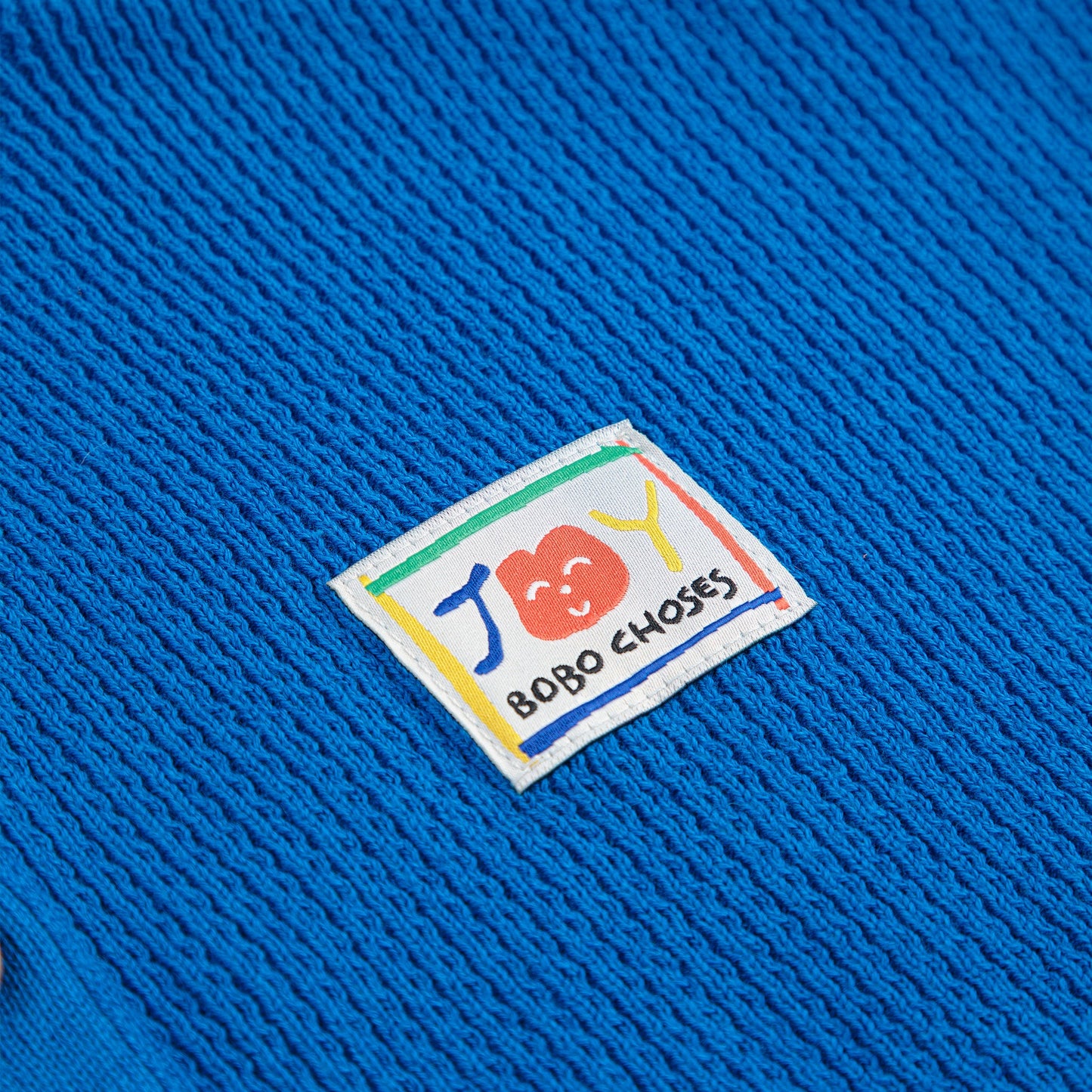 儿童蓝色笑脸刺绣针织开衫