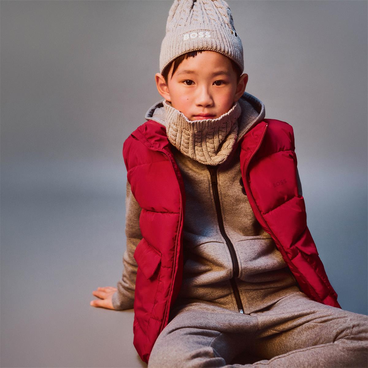 CARDIGAN A CAPUCHE