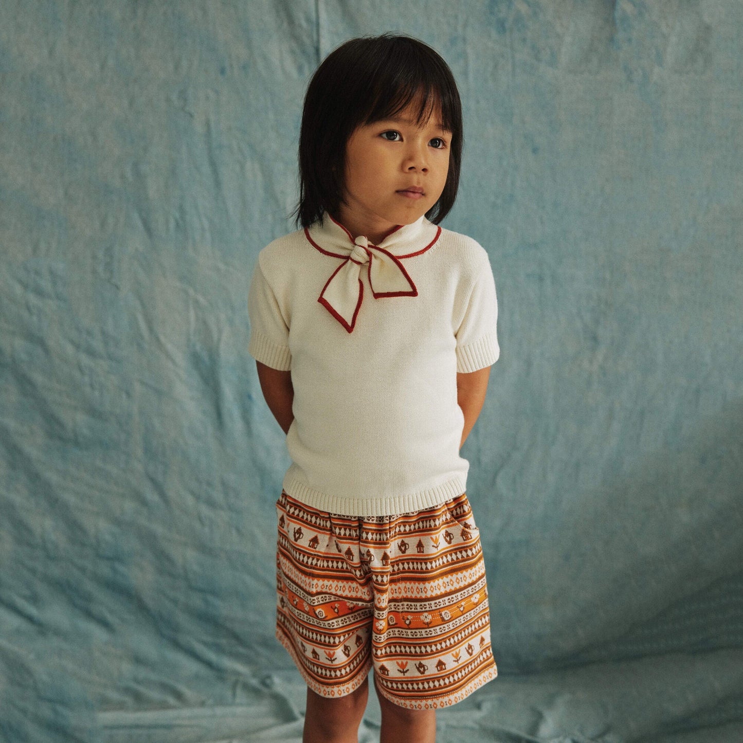 儿童白色蝴蝶结棉毛衣