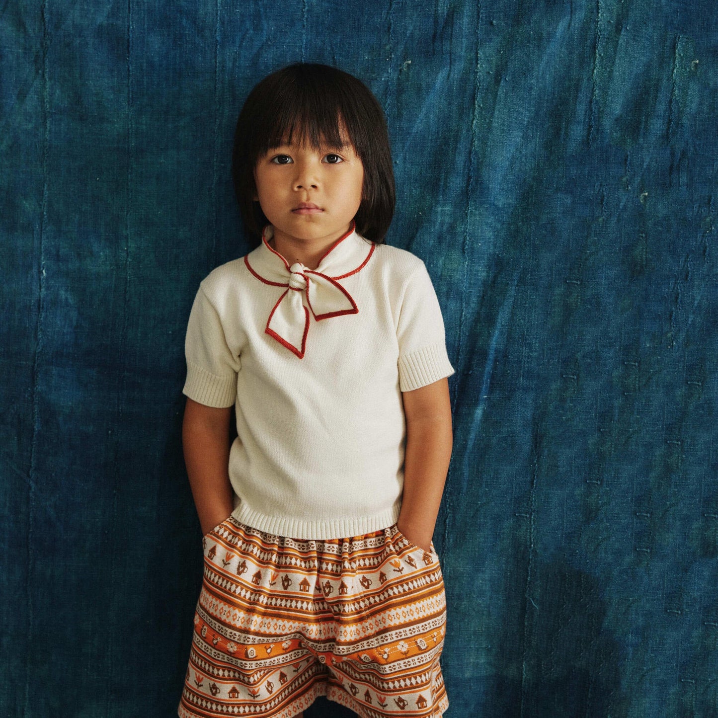 儿童白色蝴蝶结棉毛衣