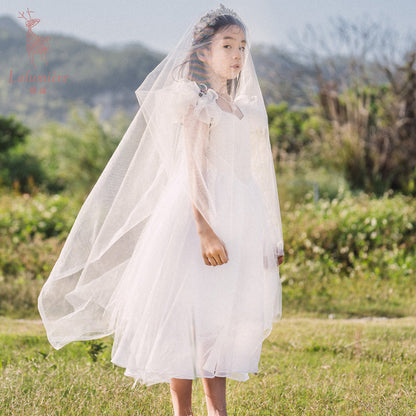 女童白色羽毛高定礼服裙