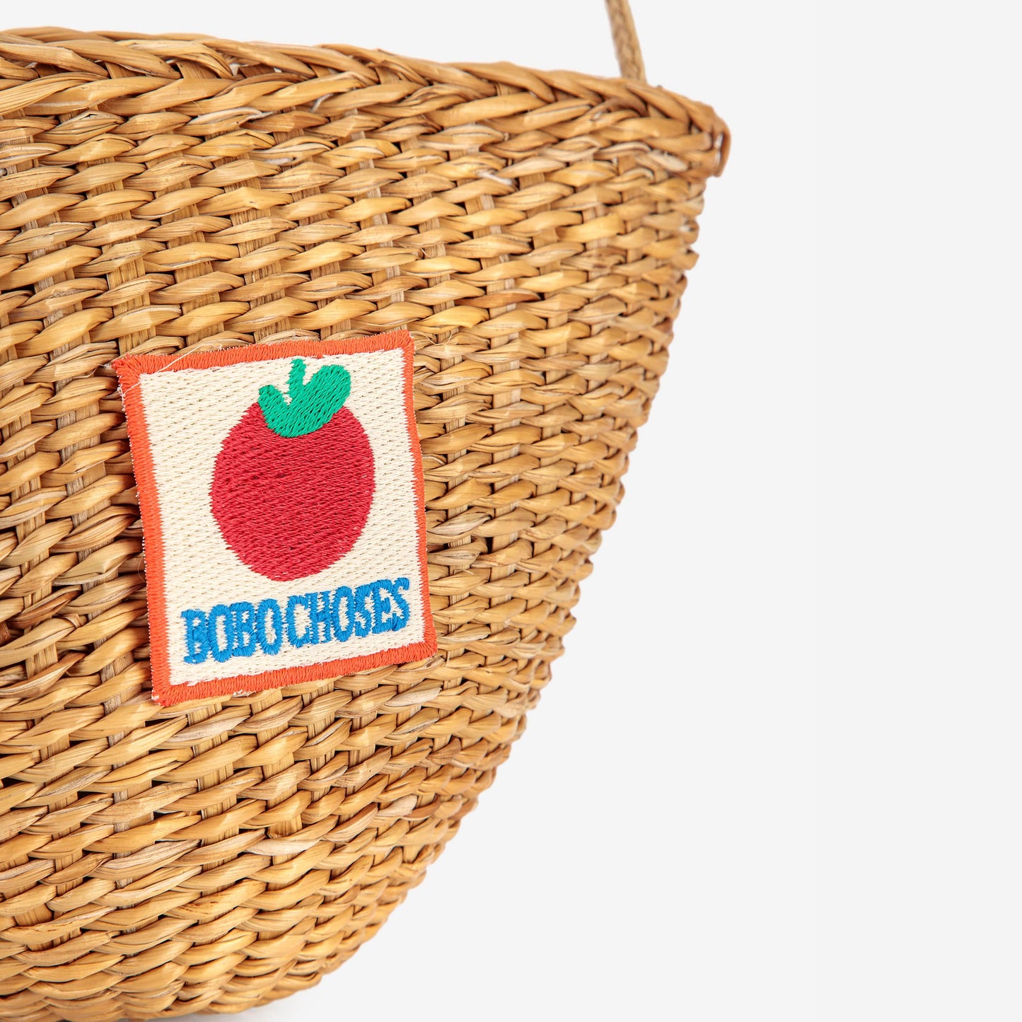 女童米色草编单肩包