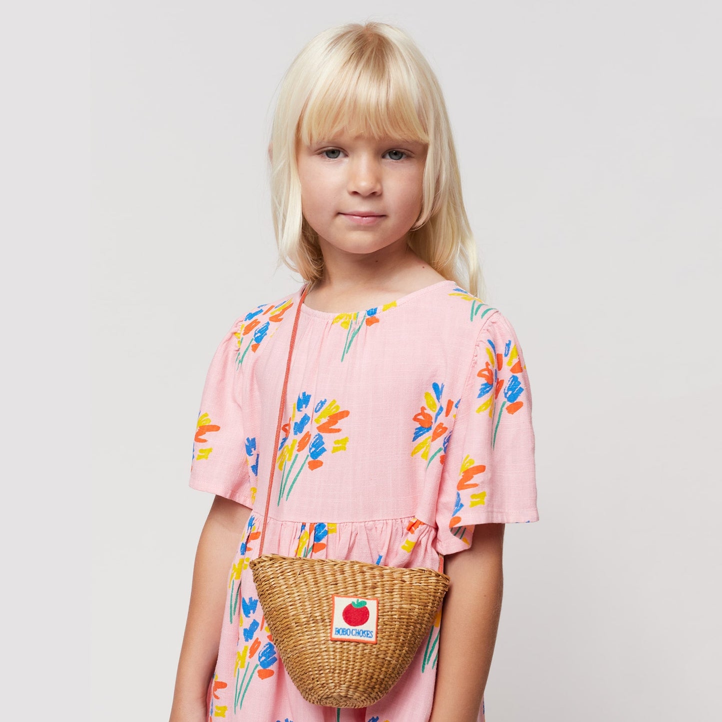 女童米色草编单肩包