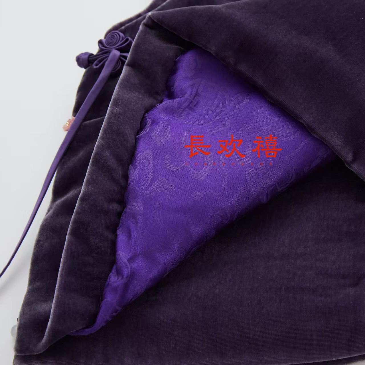 女童紫色"棒棒糖"夹棉马甲