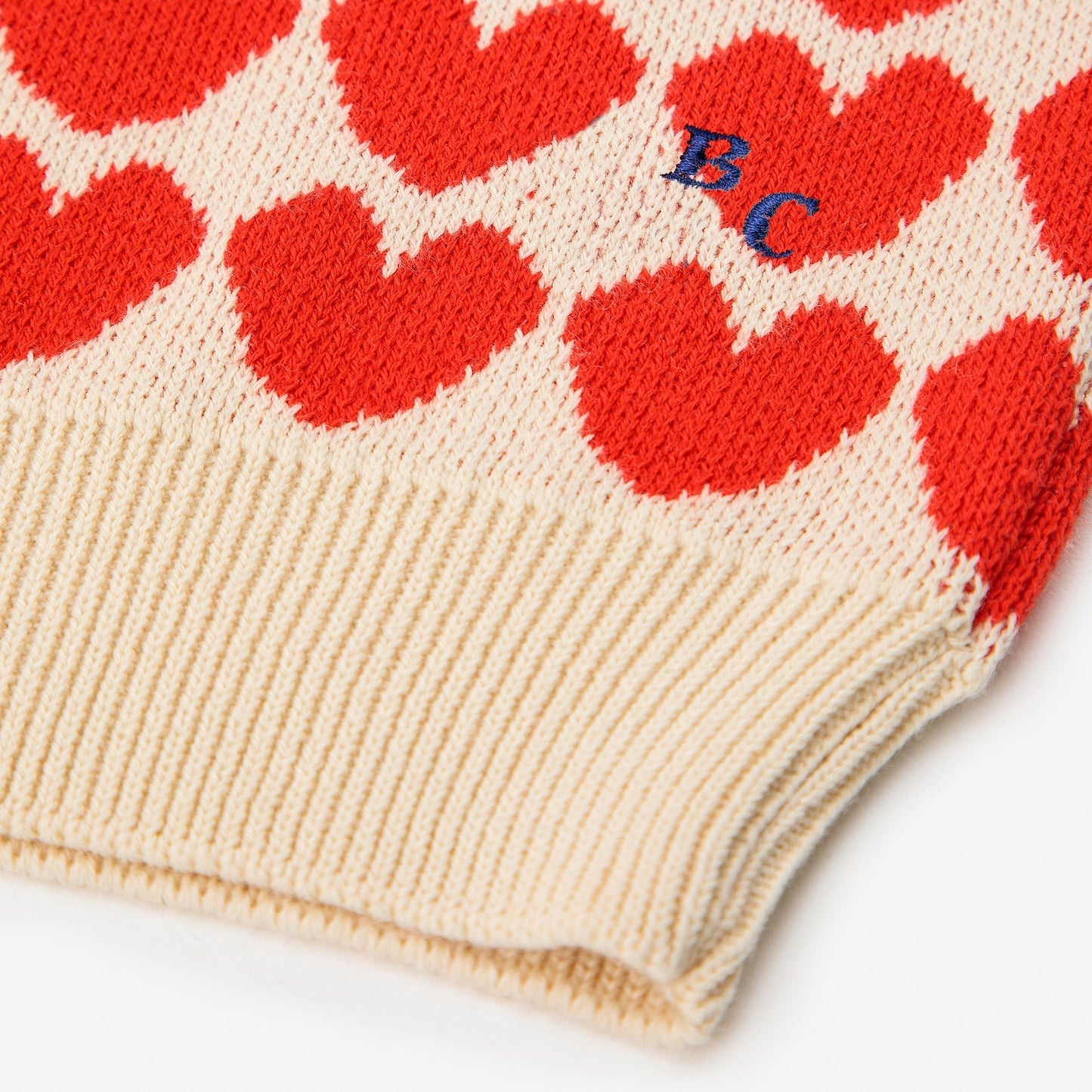 女婴米色心形毛衣