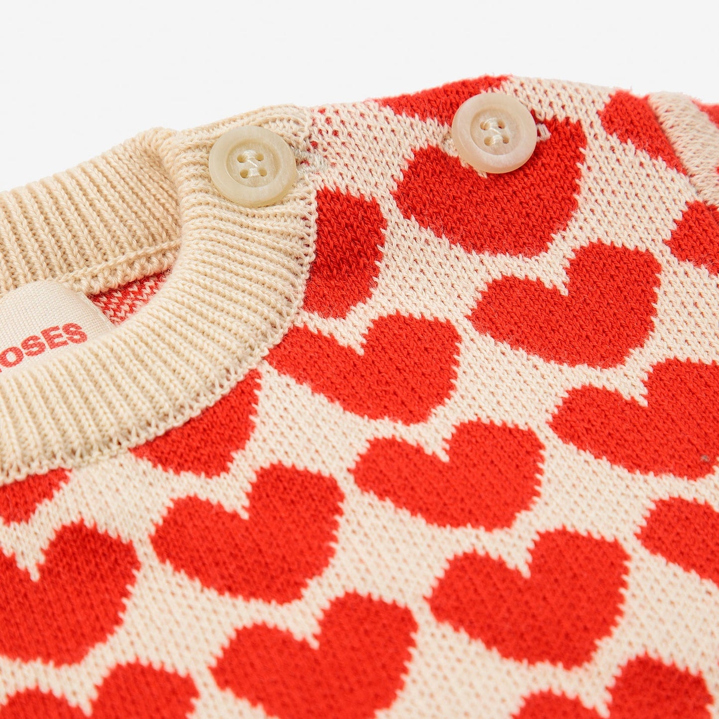 女婴米色心形毛衣