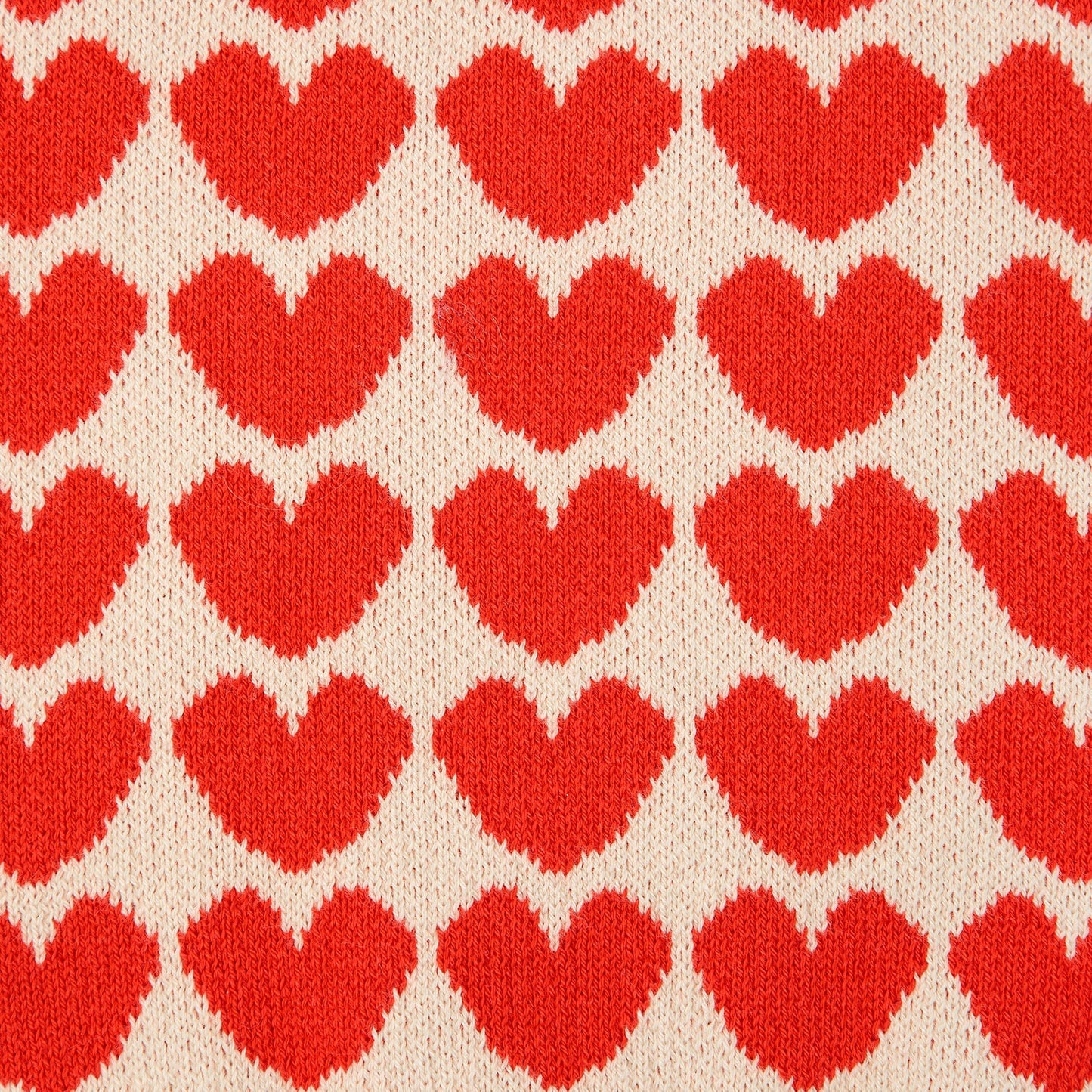 女婴米色心形毛衣