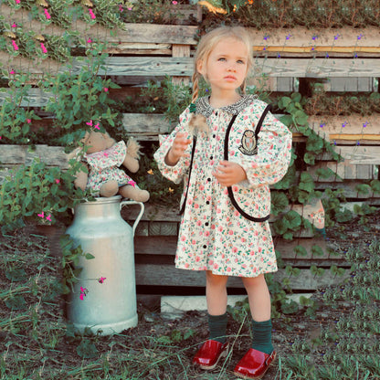 女童象牙白碎花双面马甲