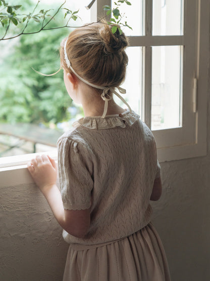 女童米粉色毛衣
