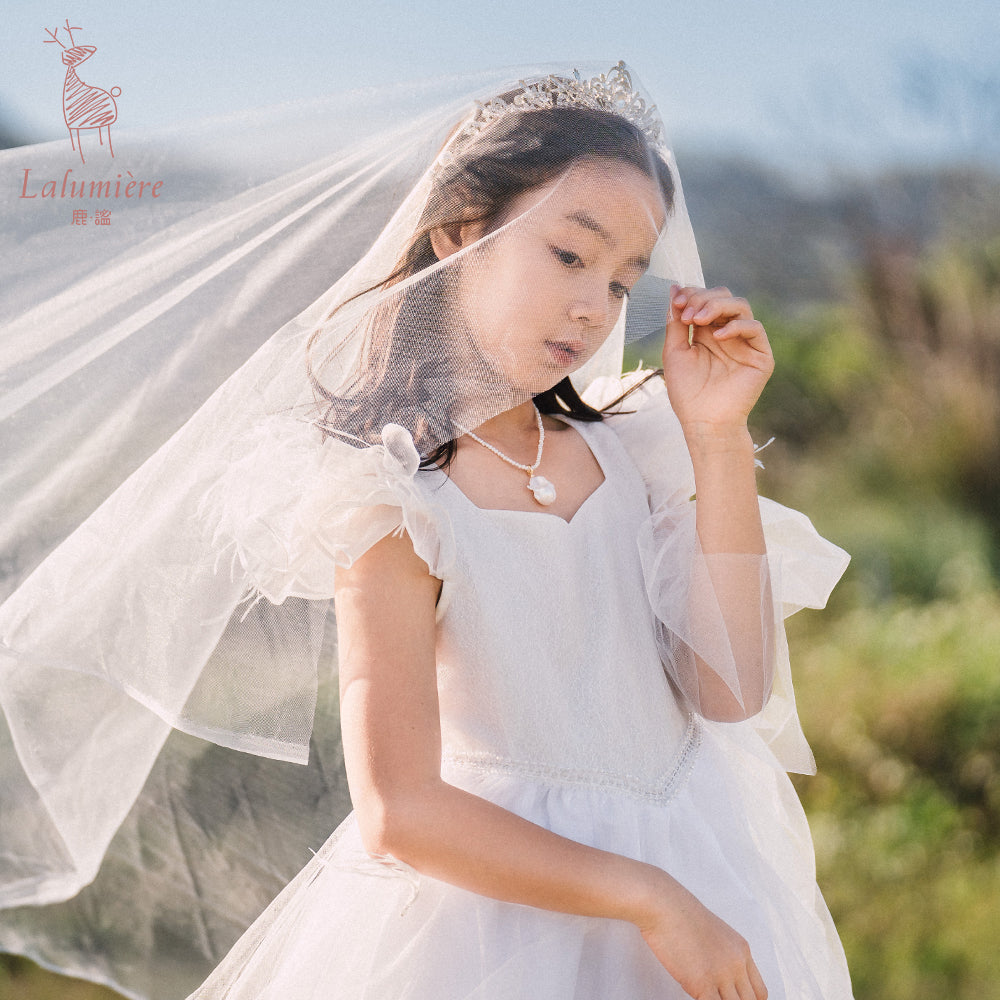 女童白色羽毛高定礼服裙