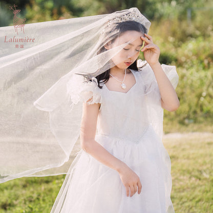 女童白色羽毛高定礼服裙