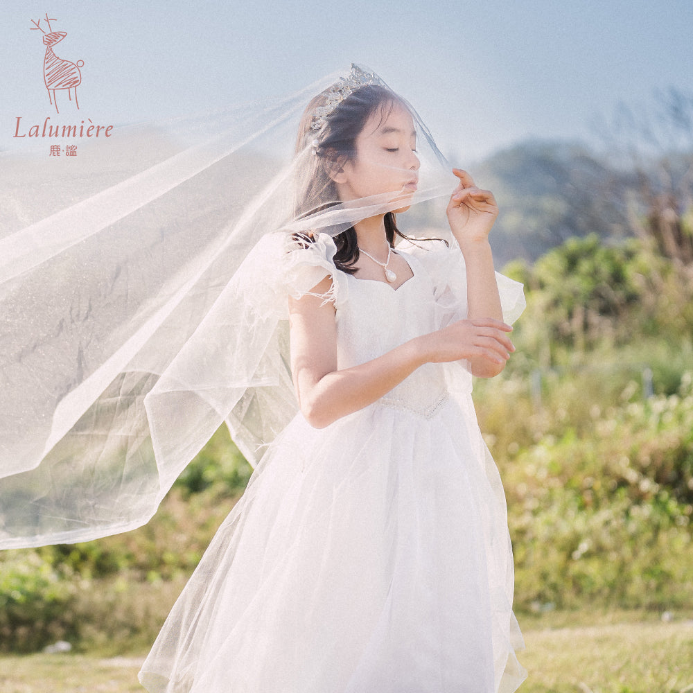 女童白色羽毛高定礼服裙
