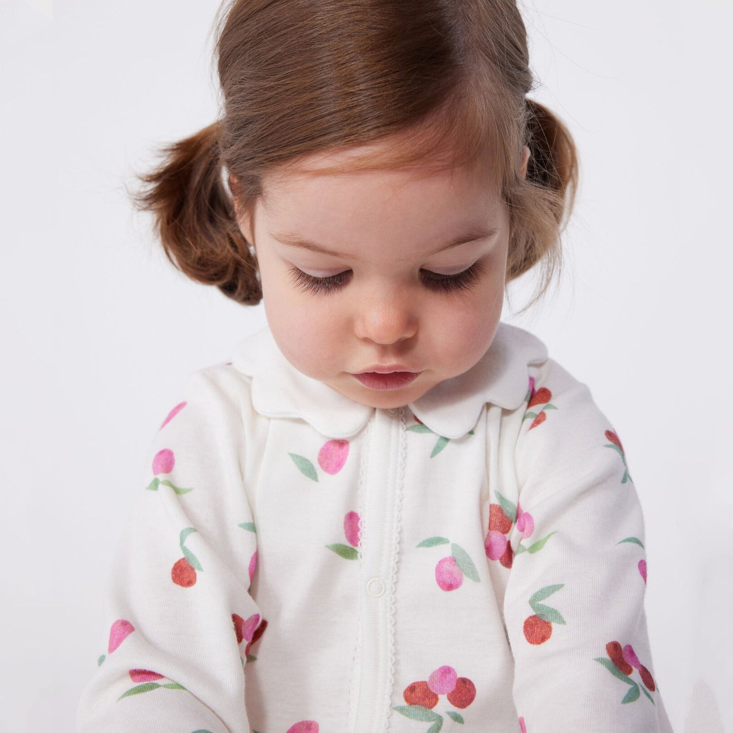 女婴象牙白印花棉连体衣