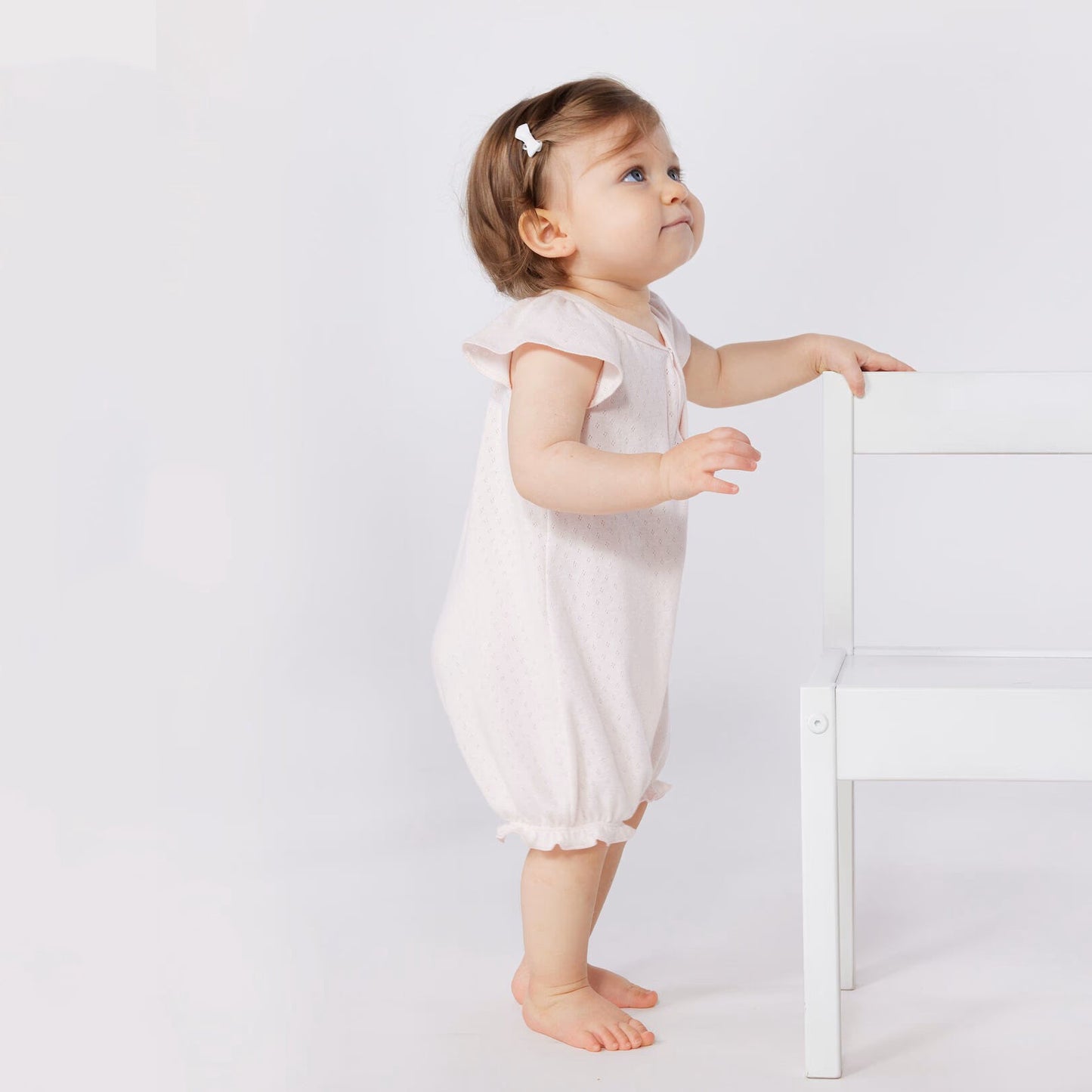 女婴浅粉色棉连体衣