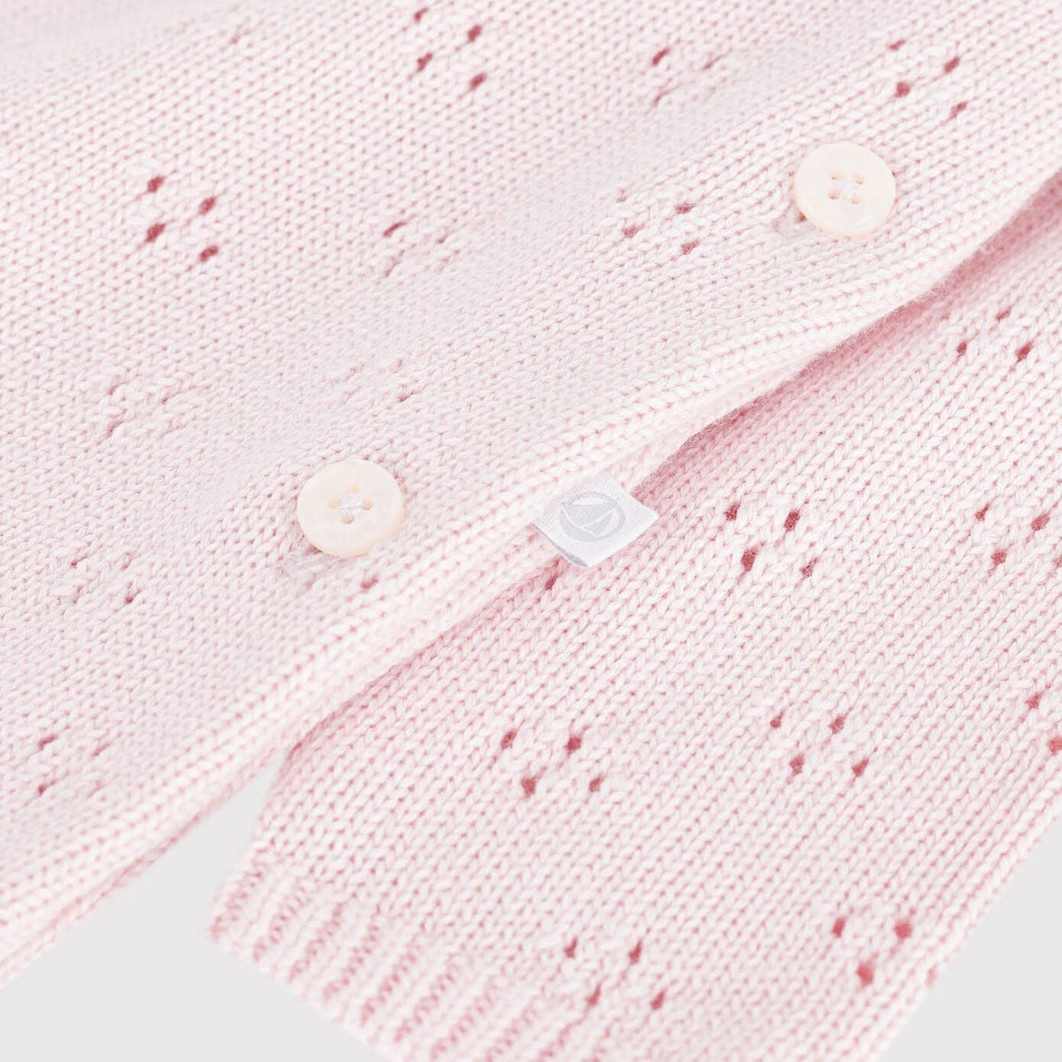 女婴浅粉色羊毛连体衣
