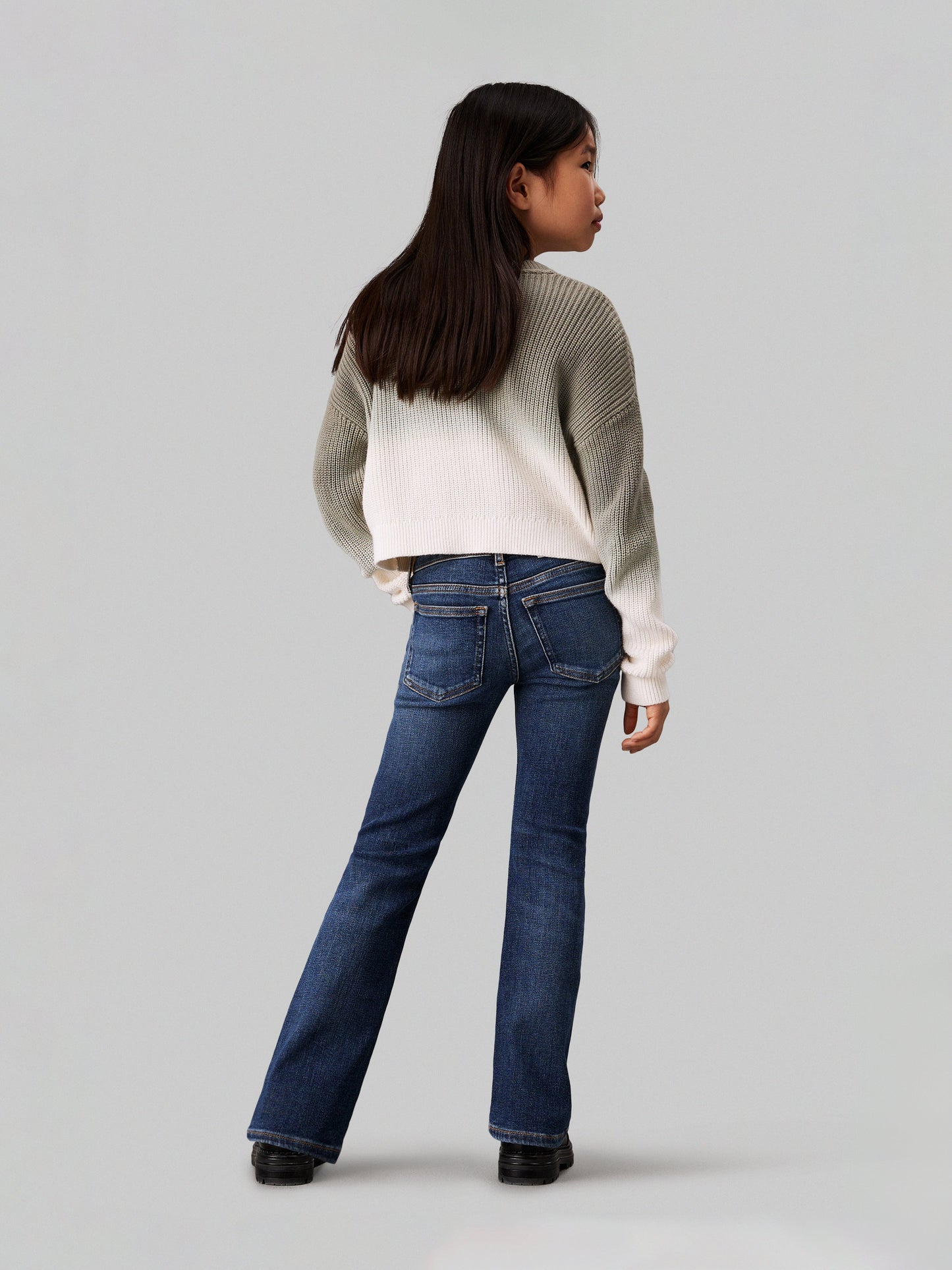 Calvin Klein Girls Mid Rise Flared Jeans in Blue