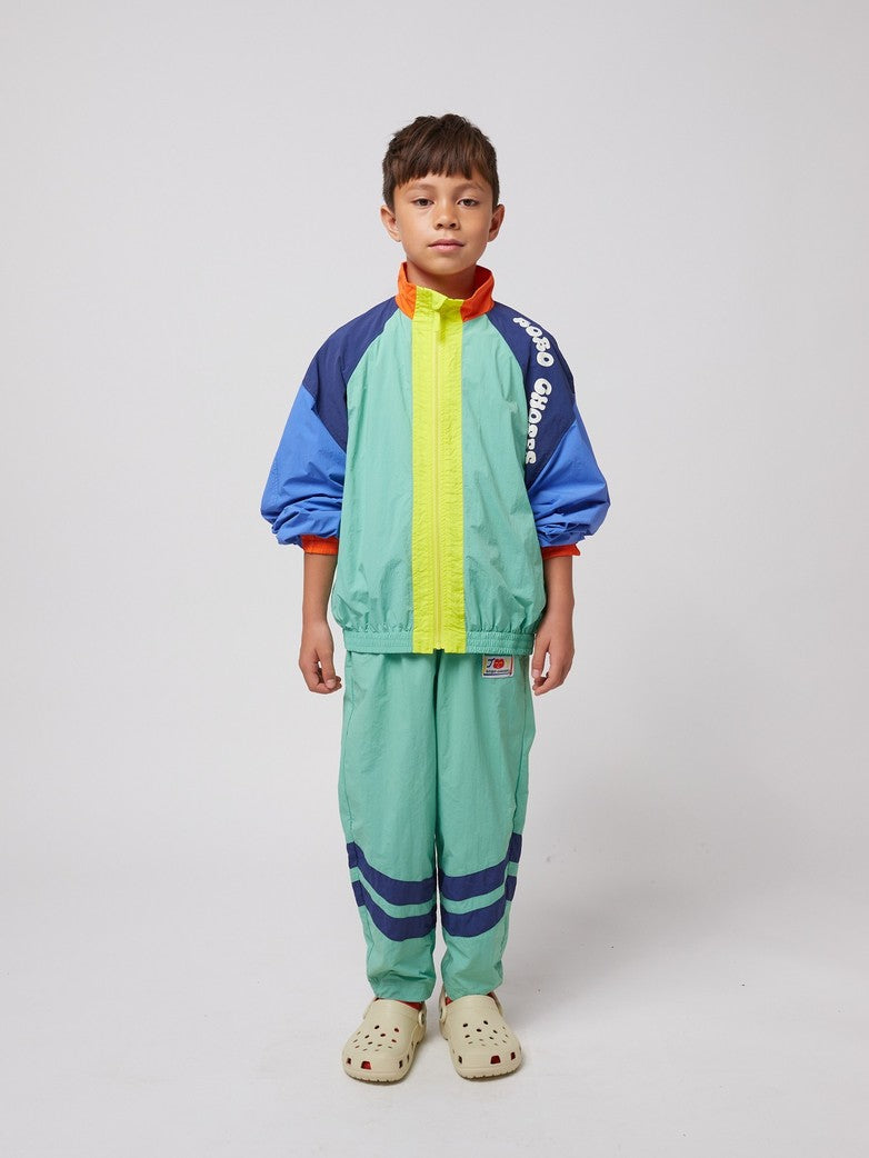 Smiling color block tracksuit pants