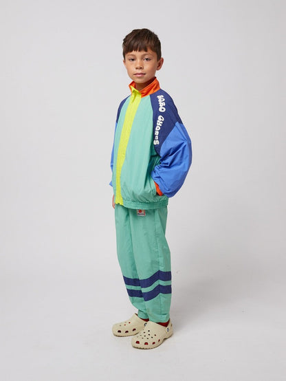 Smiling color block tracksuit pants