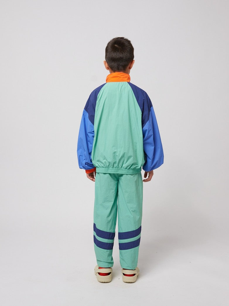 Smiling color block tracksuit pants