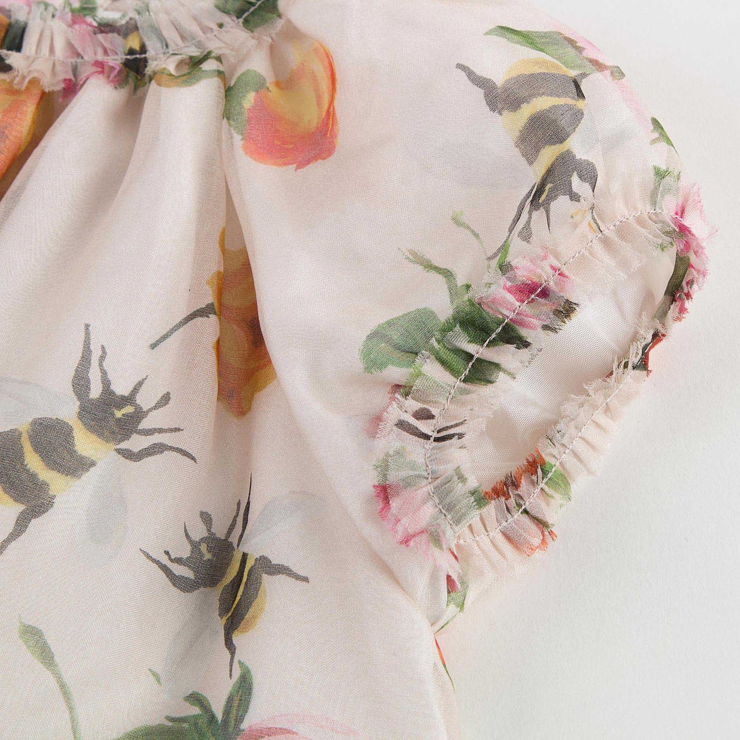 Baby Girls Ivory Dress With Flower Print Trims
