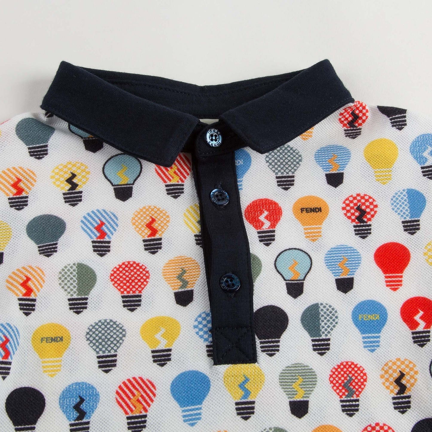 Boys Blue Polo Shirt With Multicolor Lightbulb Print