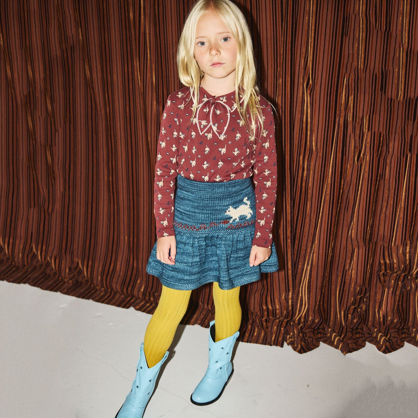 女童蓝色猫咪羊毛短裙