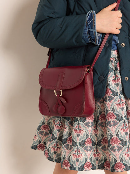 女童酒红色单肩包