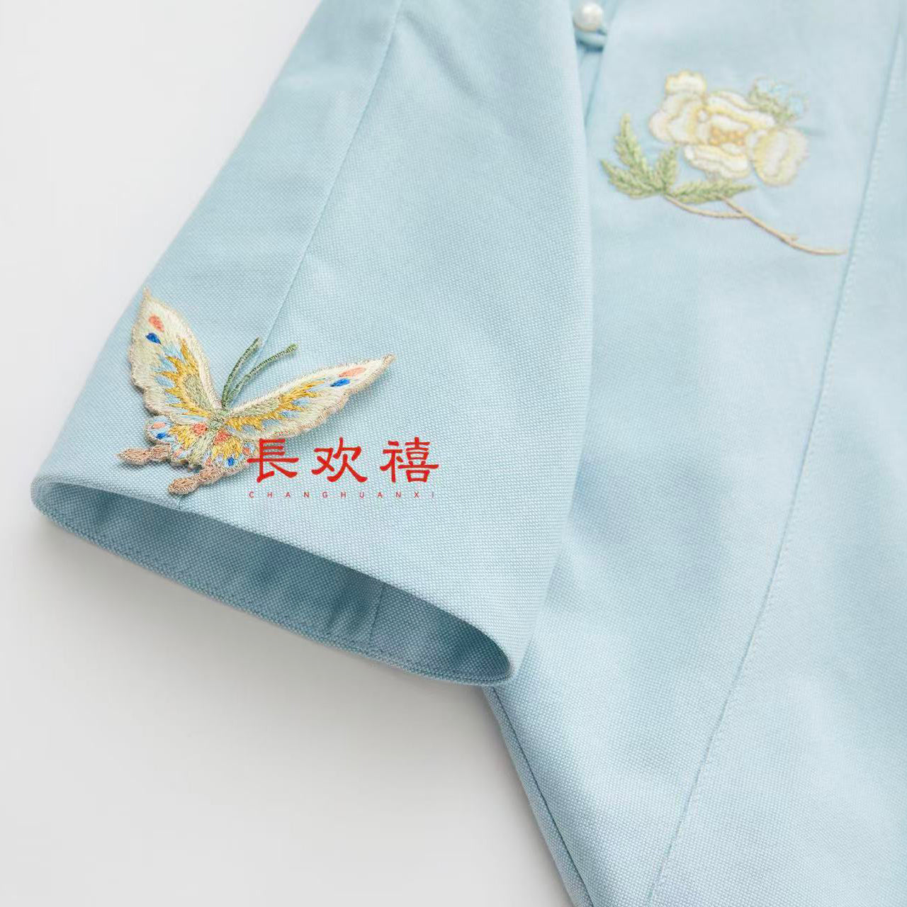 女童浅蓝色"蝶恋花"中式旗袍