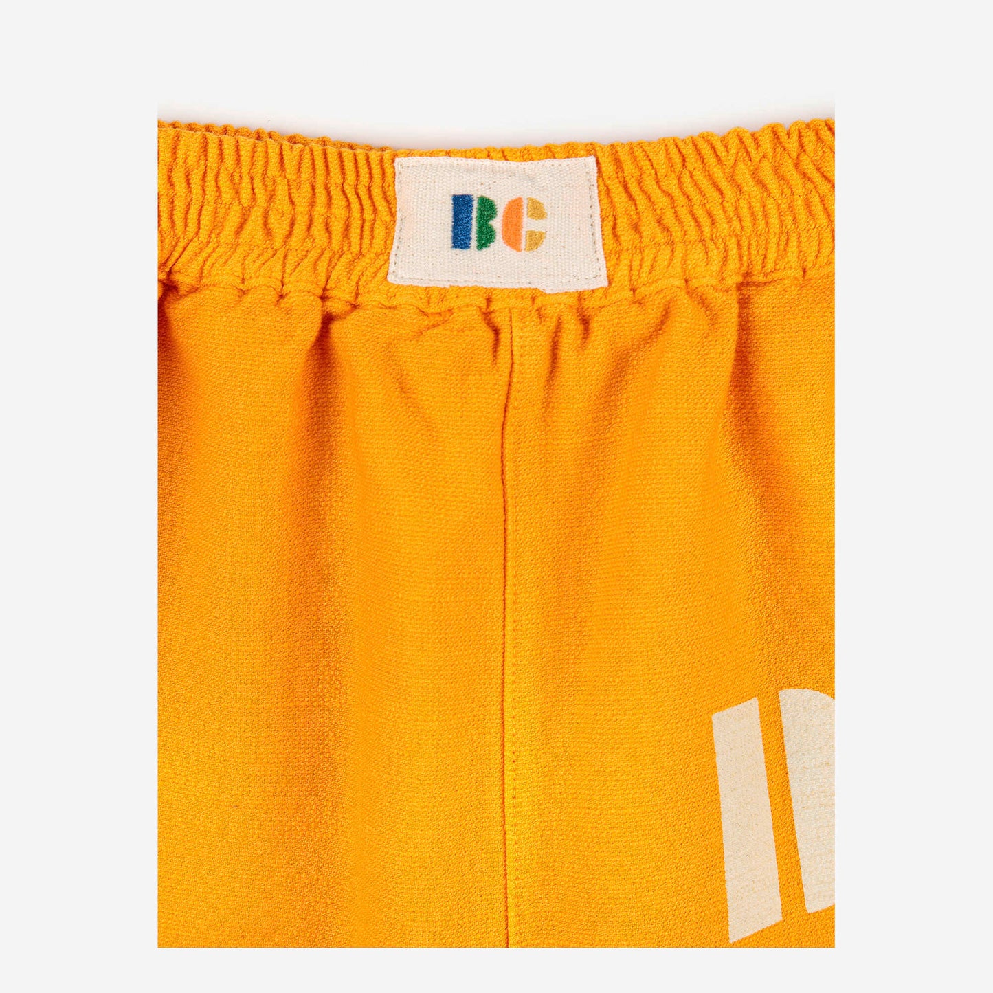 儿童橙黄色棉长裤