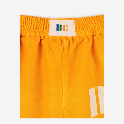 儿童橙黄色棉长裤