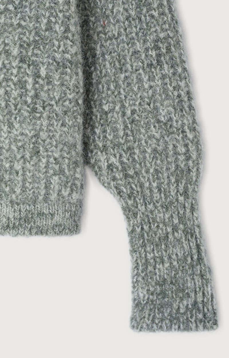 GILET COURT BOULE MANCHES LONGUES