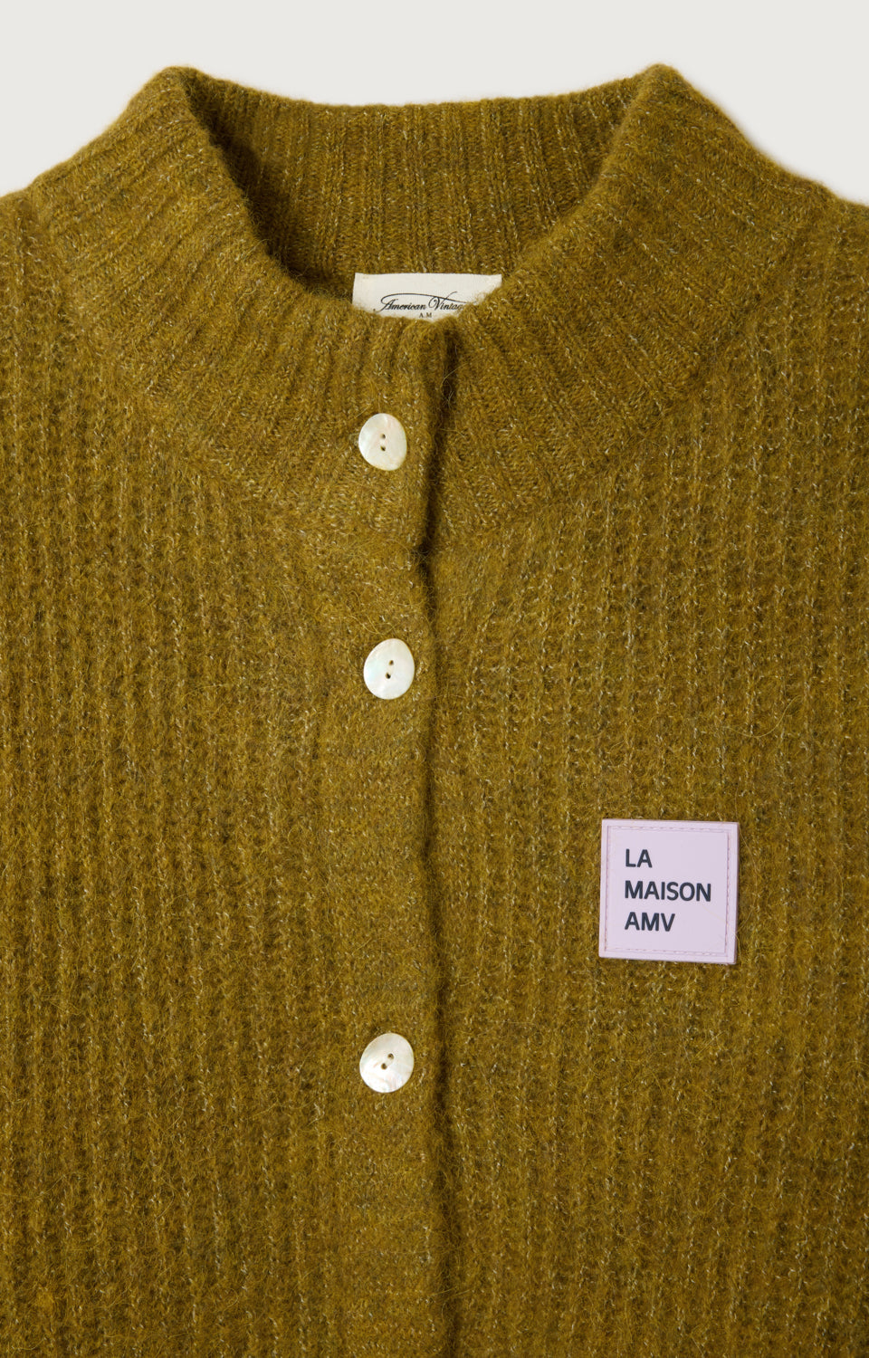 GILET COURT ML COL MONTANT BOUTONNE