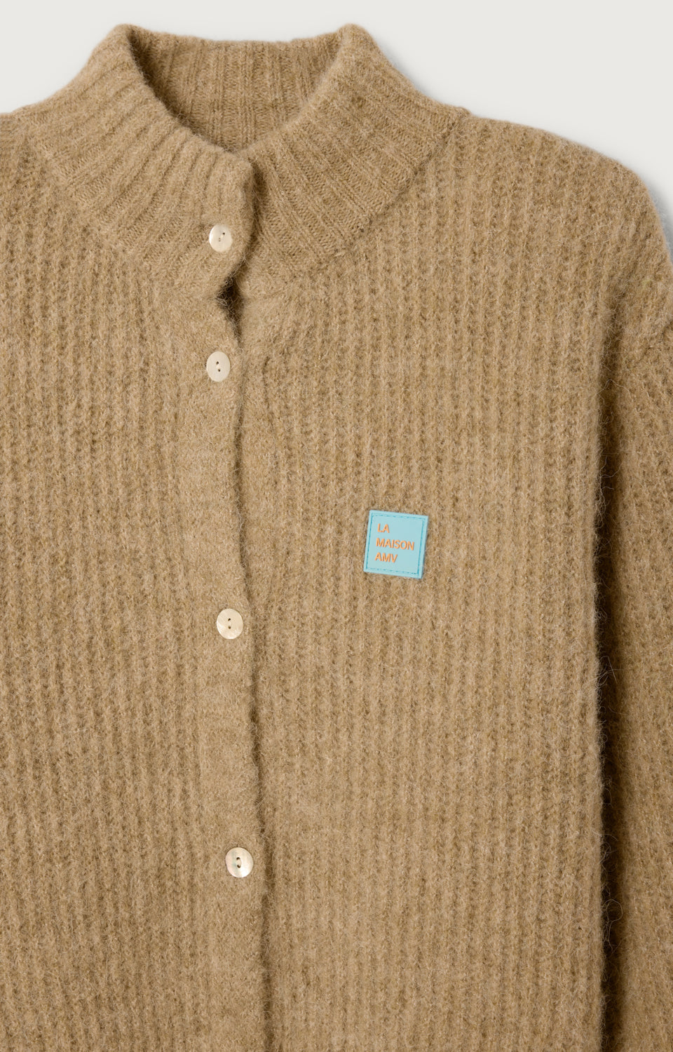 GILET COURT ML COL MONTANT BOUTONNE