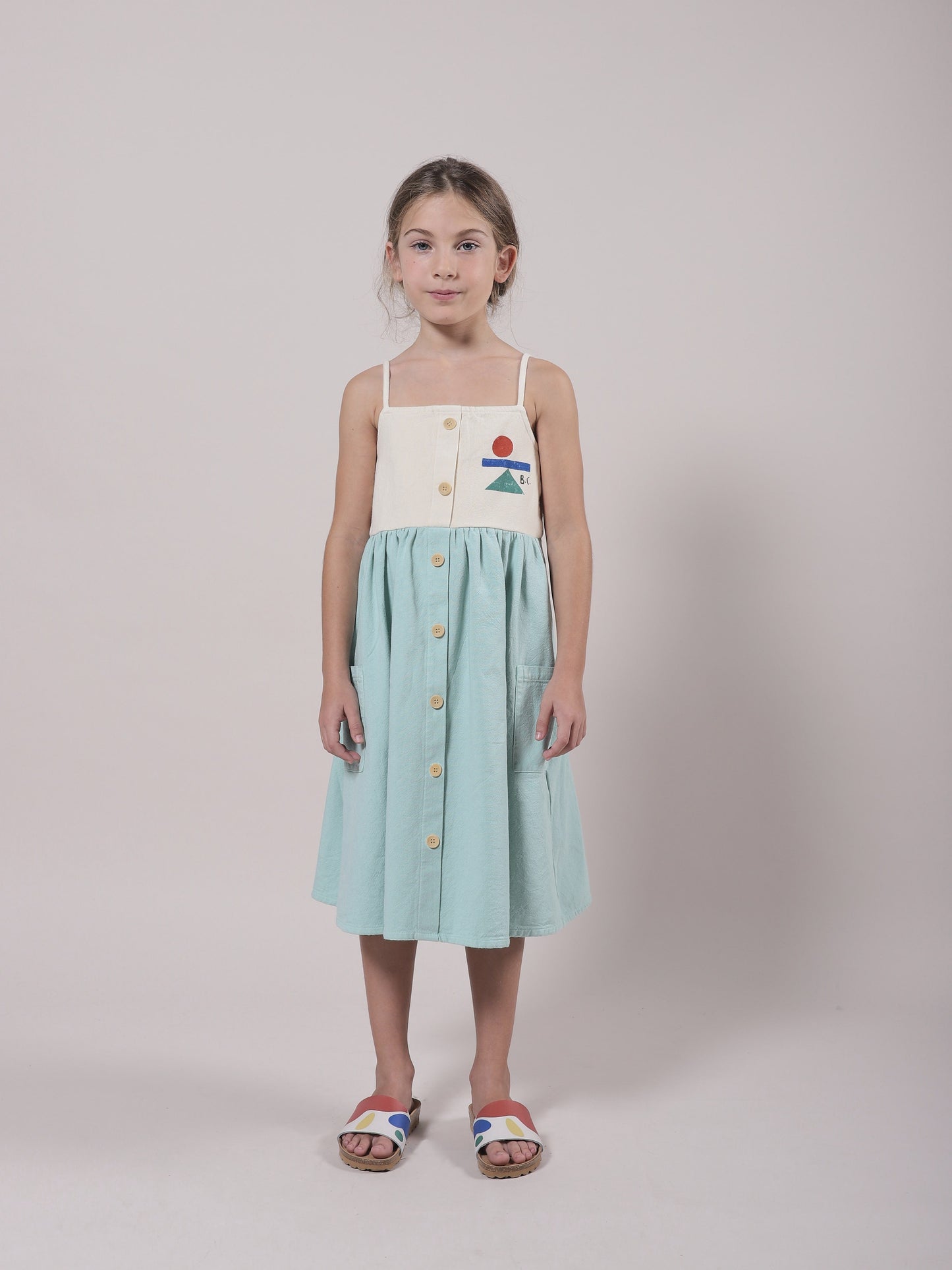 女童绿色纽扣棉连衣裙