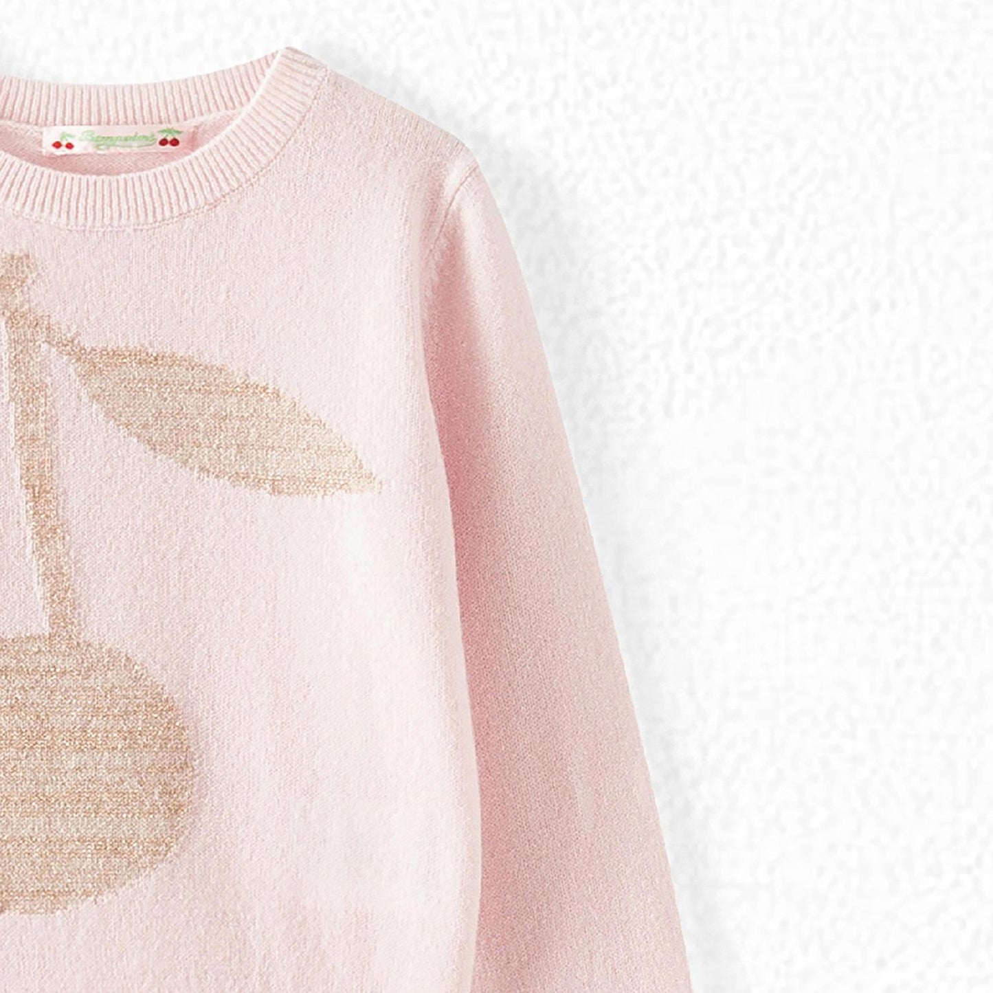 女童粉色羊绒毛衣