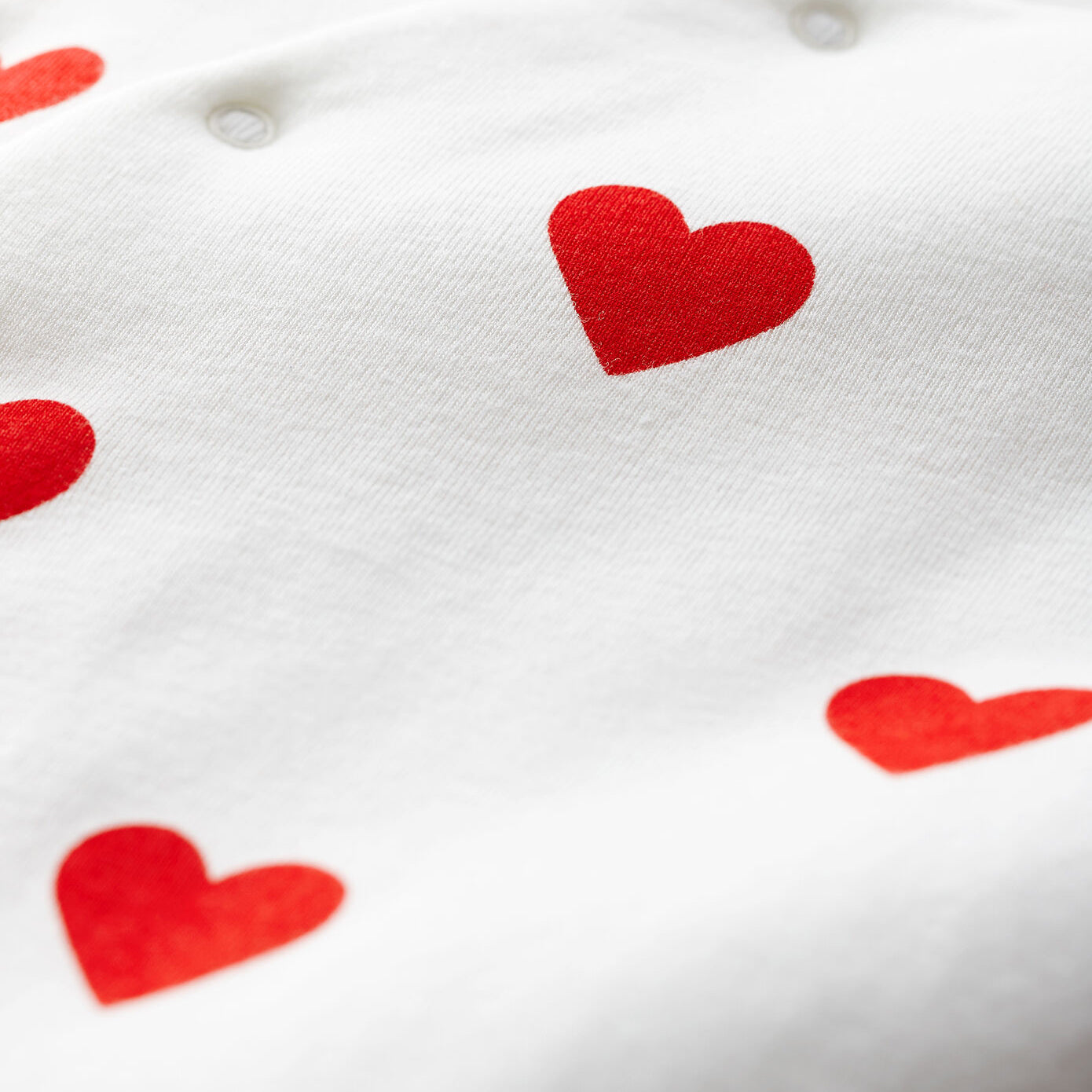女婴白色心形棉连体衣