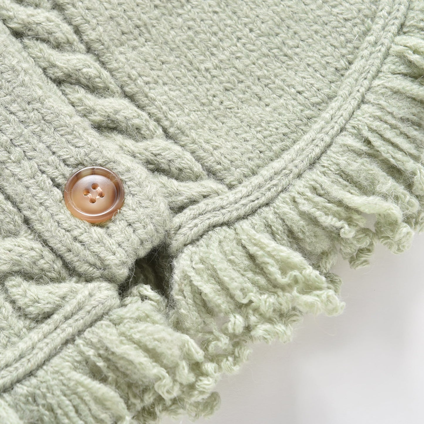 女童浅绿色羊毛针织斗篷