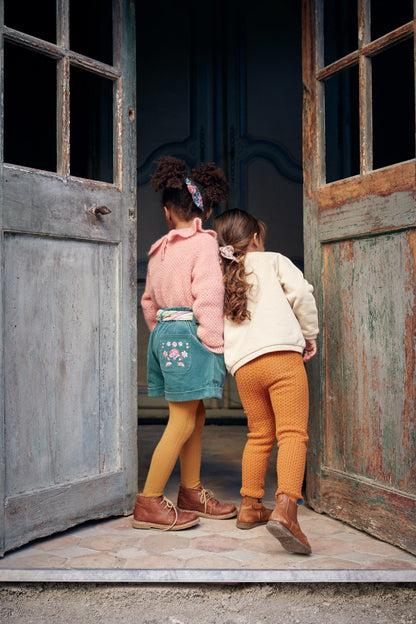 女童粉色荷叶边针织毛衣